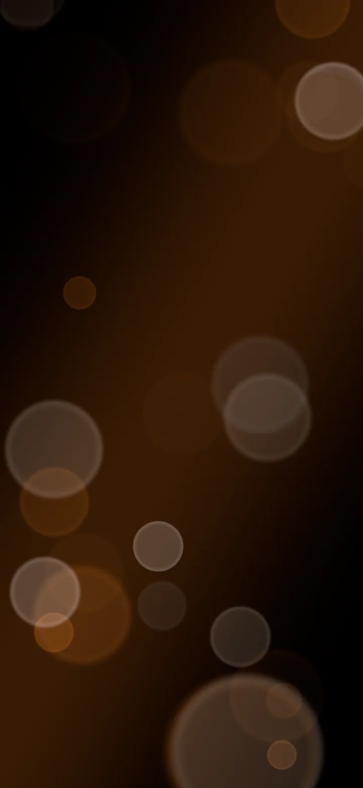 Black and Orange Bokeh Lights wallpaper for iPhone and Android